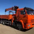 Бортовой КАМАЗ 65115 (6×4) с КМУ HANGIL HGC756 (со спальным местом) — фото с Авито